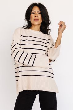 Baltic Born exclusive style! Ivory and black stripes Sweater knit material with stretch Cozy, longer length Round neckline Long sleeves Side slits Ribbed at neckline, sleeve cuffs and hem 50% Viscose, 30% Polyester, 20% Nylon Mei Li is 5’3, cup size 32A, size 0/2 and wearing size S Loose Pullover Sweater, Comfortable Sweater, Loose Pullover, Casual Stripes, Round Neck Sweaters, Cute Sweaters, Striped Knit, Long Sweaters, Knitwear Women