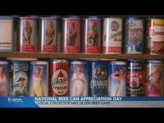 many different types of beer cans are stacked on a shelf in front of each other