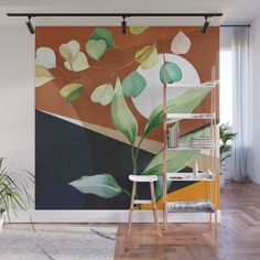 an abstract painting with green leaves on a brown background wall mural