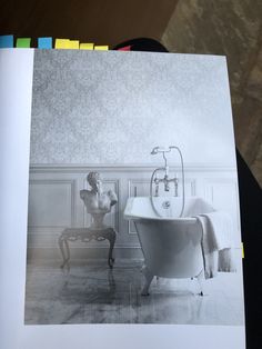 an old photo of a bathtub in a bathroom