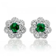 METAL SPECIFICATIONS Metal Name: White Gold 14K STONE SPECIFICATIONS Stone Name: EMERALD/DIAMOND Stone Cut : Round cut Stone Specifications: There are two green emerald approx. 2.00 carats each & approx.0.75 carats round smaller diamonds on side in each earring Natural earth-mined diamonds Total Stone Weight : approx. 5.50 carats Color : Green/F Clarity : AAA/VVS1 APPRAISAL Appraised Value : $ 11799.00 Comes with a FREE APPRAISAL All kind of customization and options available for Metals, Di Halo Diamond Earrings, Flower Halo, 3 Carat Diamond, Halo Earrings, Emerald Earrings, Diamond Flower, Emerald Jewelry, Diamond Stud, Green Emerald