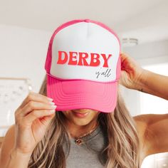 🏇 Kentucky Derby 150 is almost here, what better hat to get and wear to the track than this Derby y'all retro trucker cap.  Four fun colors are available (including, Pink, Black, Red and Blue, and Green) and they make great group hats. If you have a group going to the infield at the track, have everyone wear this hat and always know where each other is! This vintage hat is fun to wear all year round when you have the Derby spirit. Perfect for the horse lover, best friend, hostess, and of course Talk Derby To Me, Retro Hat, Derby Horse, Ky Derby, Retro Hats, Vintage Hat, Gifts For Horse Lovers, Kentucky Derby, Horse Lover