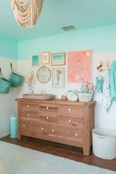 Here are 21 spectacular under-the-sea nursery ideas to inspire you. Teal Girl Room, Turquoise Nursery Girl, Colorblock Room, Beachy Kids Room, Tropical Nursery Theme, Ocean Blue Bedroom, Beach Nursery Girl, Tropical Nursery Girl