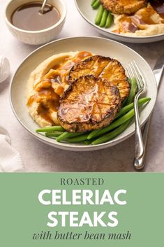 roasted celeriac steak with butter bean mash and green beans on a white plate