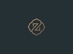 the letter z is inscribed in gold on a black background