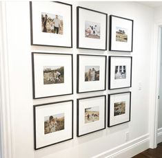 several black and white pictures hanging on the wall