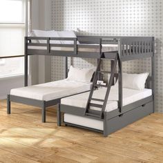 a bunk bed with a pull out trundle and mattresses on the bottom