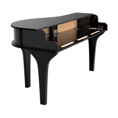 a black piano sitting on top of a wooden table