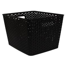 a black plastic basket with holes on the sides and handles, sitting against a white background