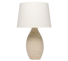 a white table lamp with a white shade on it's base and rope wrapped around the base