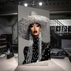 a woman wearing a large hat with pearls on it's head is standing in front of a mirror