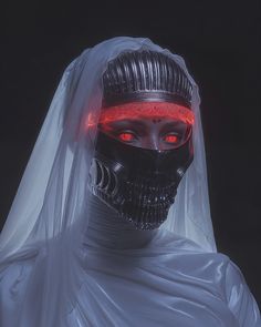 a person wearing a white veil with red eyes and a black mask on their head