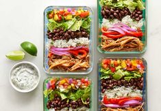 four plastic containers filled with different types of food