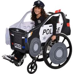 a woman in a police costume is sitting on a wheel chair that has wheels attached to it