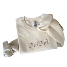 The blue version of our best selling original Mama shirt, this sweatshirt was designed for all the boy moms in mind. Each sweatshirt is embroidered with multi needle machine and we use a deep blue thread with a neutral thread. Mama is spelled out with different flowers within the letters. Sweatshirt is tan and lined with fleece. 50% cotton, 50% polyester Sweaters run slightly big, but if you're looking for a true oversized look size up. Mama Sweatshirt, Different Flowers, Boy Mom, The Boy, Mama Shirt, Kids Wear, Deep Blue, Blue Floral, Thread