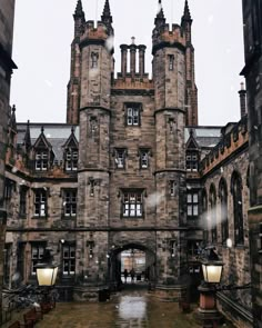 an old building with many windows and towers