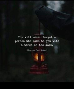 someone holding a lantern with the words you will never forget a person who came to you with a torch in the dark