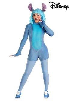 a woman in a blue costume is talking on her cell phone while wearing an animal suit