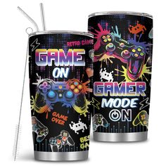 a tumbler cup with an image of video game controllers on it and the words game on