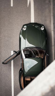 an overhead view of a green sports car