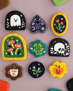 the cookies are decorated with different designs and colors