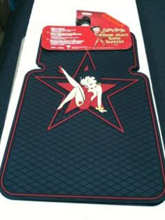 the floor mat is designed to look like it has a star and two dancers on it