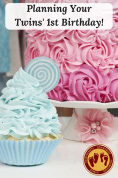 a birthday cake with pink and blue frosting on it, next to a cupcake that says planning your twins 1st birthday