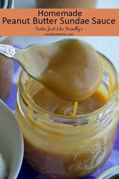 homemade peanut butter sundae sauce in a jar with spoon