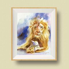 a watercolor painting of a lion laying down with its head on the ground next to a small bird