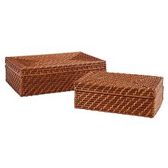 two brown wicker boxes sitting next to each other