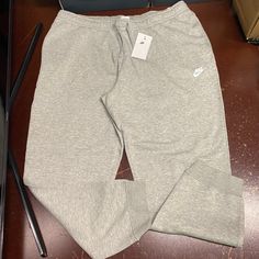 Nike Womens Gray Standard Fit Mid Rise Fleece Tapered Jogger Pants Size Xxl Brand: Nike Department: Women Size: Xxl Color: Gray Type: Pants Style: Jogger Pattern: Heather Theme: Sports Occasion: Activewear Season: All Seasons Features: Comfort Pockets Condition: New With Tags I Offer Discounts For All Return Customers. - Jvs Nike Gray Athleisure Joggers, Comfortable Nike Fleece Joggers, Gray Full-length Joggers For Sports, Nike Moisture-wicking Fleece Joggers, Gray Full-length Joggers For Jogging, Athleisure Pants, Nike Sportswear Women, Black Jogger Pants, Black Windbreaker