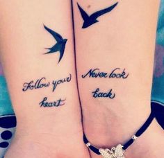 two people with matching tattoos that say follow your heart and never look back on their arms