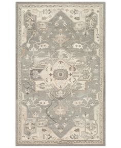 a gray and white rug with an intricate design