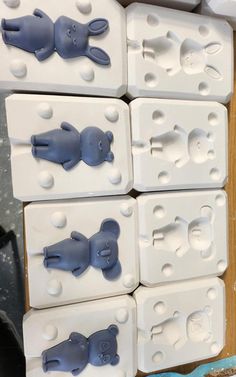 several white and blue animal shaped drawer knobs