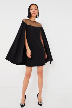 Black Estelle Cape Dress | Tuckernuck Dress With Cape Sleeves, Dresses With Capes, Wedding Officiant Outfit, Dress With Cape, Cape Dress Short, Black Cape Sleeve Festive Dresses, Luxury Black Dress With Cape Sleeves, Luxury Fitted Black Cape, Black Fitted Cape Dress