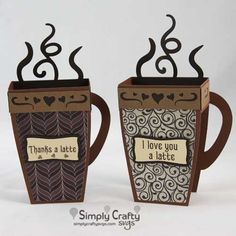 two coffee mugs that have been made out of cardboard