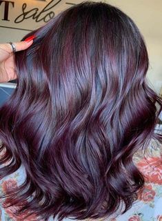 Explore here so many best shades of red and purple hair colors and try one of the best options for long locks to convert them into modern lookThere are so many amazing hair color options for long hair like blonde and balayage hair color ideas but you may also consider the beauty of red purple hair colors in 2019. Red Temporary Hair Color, Red And Purple Hair Color, Aubergine Hair Color, Dark Purple Hair Dye, Red And Purple Hair, Purple Hair Dye, Divorce Celebration, Purple Hair Color, Dark Purple Hair