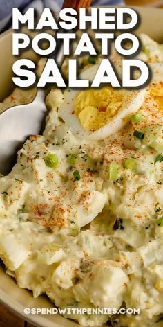 mashed potato salad in a white bowl with a spoon and text overlay that reads mashed potato salad