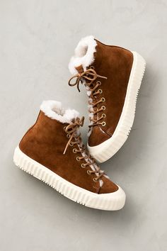 Wishing for winter-ready high-tops to make sporty sneaker season last all year long? Grab a pair of our Avery high-top sneakers, which offer a luxurious take on a timeless casual style. Made from water-resistant, full-grain Spanish suede, these lace-up kicks with bumper toes feature aesthetic ridged rubber platforms and thermo rubber outsoles for traction on slippery sidewalks. Plush shearling lining and breathable Merino wool-lined footbeds keep your feet cozy warm and comfy even as the mercury drops. Fall High-top Lace-up Sneakers With Textured Sole, Fall High-top Sneakers With Textured Sole And Lace-up, Trendy Suede High-top Sneakers, Casual Leather High-top Sneakers For Winter, Winter Suede Mid-top Sneakers, Winter Mid-top Suede Sneakers, Sporty Fall Boots With Contrast Sole, Mid-top Suede Sneakers For Winter, Casual Winter High-top Sneakers With Textured Sole