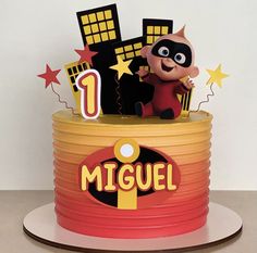 the birthday cake is decorated like a cartoon character