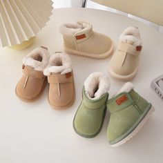 These baby winter snow boots for girls and boys are designed to keep their little feet warm and cozy during the cold winter months. They feature a candy-colored suede upper and a thick fur lining for added warmth. The high-top design provides extra protection against the cold, and the boots are easy to slip on and off with a simple closure. These boots are perfect for toddlers and are a great addition to any winter outfit.Product Details Baby Boy Winter Outfits, Baby Snow, Boots For Girls, Baby In Snow, Girls Snow Boots, Snow Girl, Baby Boy Clothing Sets, High Top Boots