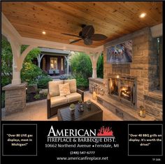 an outdoor living room with fireplace and ceiling fan