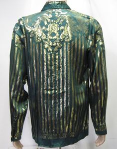 "GREEK STYLE SILK SHIRT GREEN European Style Dress Beautiful 100% Metallic Silk Shirt , Green and Gold all over .Beautiful design . Hidden Gold Finish Buttons Men's Sizes : Medium and Large Comfort Fit with Beautiful details all over Excellent condition Please see measurement for proper fitting or compare to one shirt that fit you good Unisex Adults TAG SIZE SMALL : Pit to Pit With the shirt lying flat : 22\" inches, Sleeve Length, measured from the top of the shoulder seam to the end of the arm Festive Vintage Long Sleeve Blouse, Fitted Green Festive Top, Festive Long Sleeve Shirt For Spring, Green Formal Shirt For Fall, Formal Green Shirt For Fall, Fitted Green Top For Festive Occasions, Vintage Fall Party Shirt, Festive Green Long Sleeve Top, Elegant Green Tops For Festive Occasions