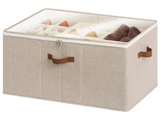 an open canvas storage box with shoes inside