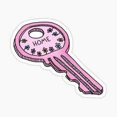 a pink key shaped sticker with the word home on it