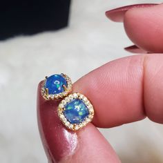 Absolutely Stunning 2 Ct Round Blue Australian Opal 14k Stud Back Earrings New Material Color 14k Gold Blue Opal / Swarovski Crystal's Women's Stud Earring Closure Type Butterfly Push Back Blue Jewelry With Halo Setting For Gift, Blue 14k Gold Jewelry With Prong Setting, Blue Halo Setting Jewelry For Gift, Blue Round Cut Halo Design Jewelry, Elegant Blue 14k Stamped Jewelry, Formal Blue 14k Gold Jewelry, Blue Halo Setting Jewelry Gift, Blue Sterling Silver Jewelry Stamped 14k, Blue 14k Gold Earrings For Anniversary