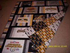 this is a quilt made to look like the pittsburgh football team's logo on it