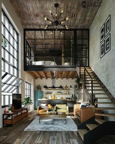 a living room filled with lots of furniture next to a stair case in an old brick building