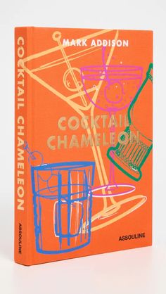 a book with an orange cover and blue writing on the front, which reads cocktail chamelon