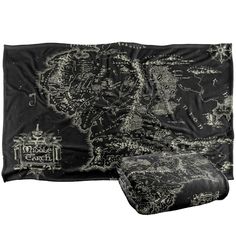 a black and white blanket with a map on it